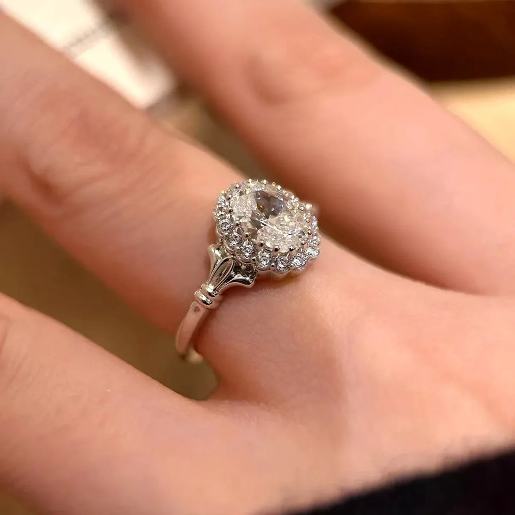 Silver adjustable ring with a large geometric bridal bouquet design and diamond treatment.