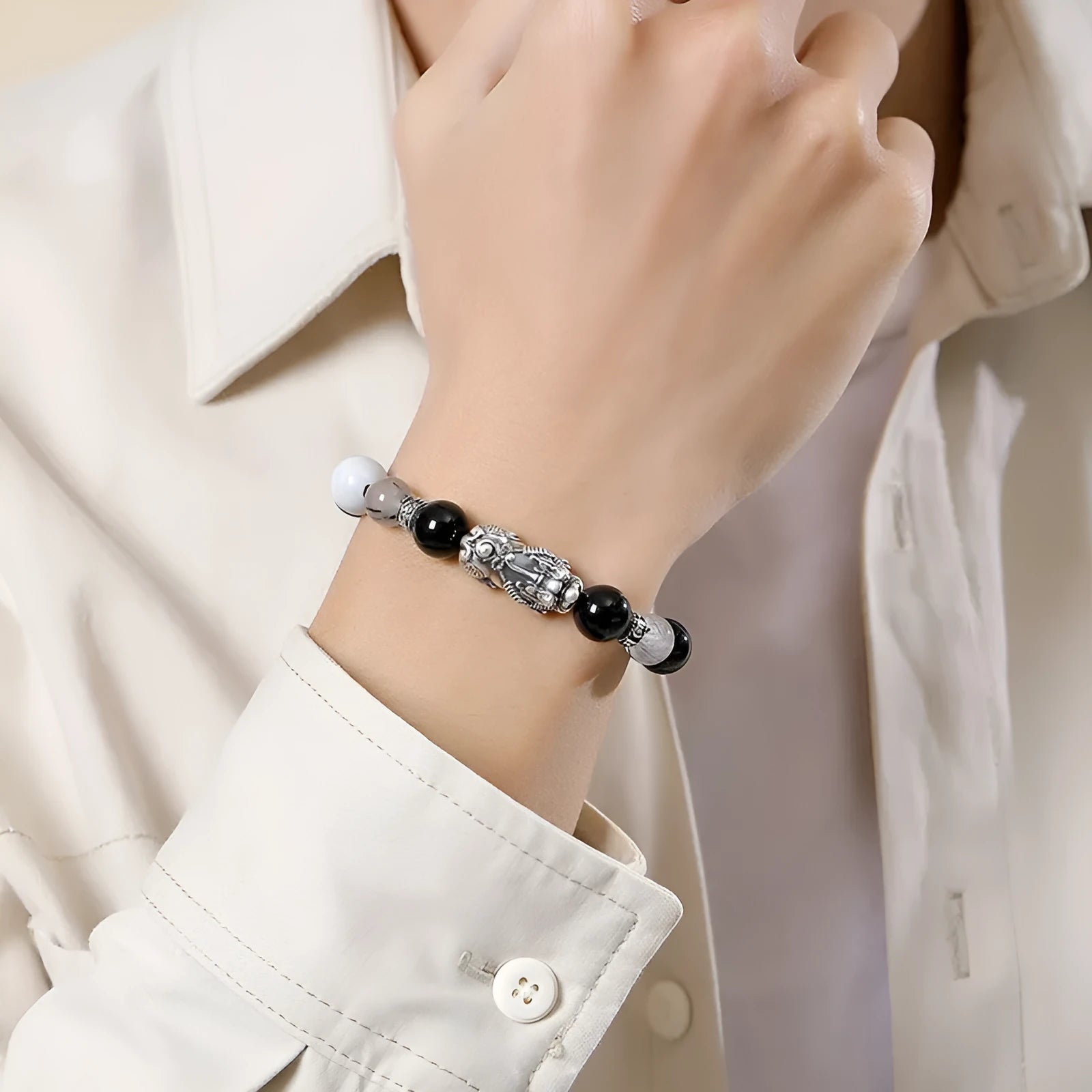 Hand-woven 999 sterling silver couple bracelet set with animal elements and tassel details