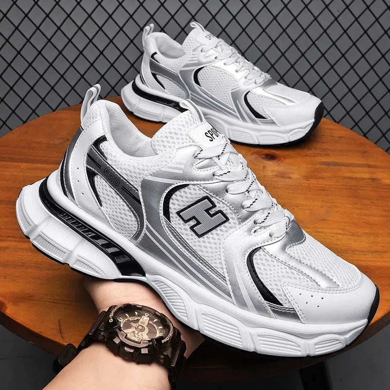 Men's mesh running shoes in black, white and grey, and white orange colours with plastic soles