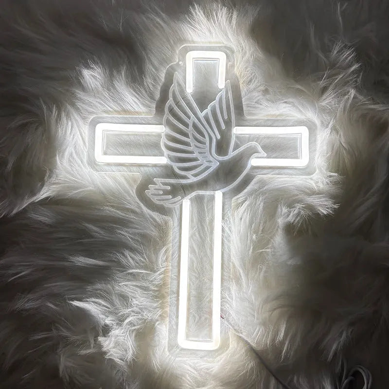 Acrylic LED neon light plate with peace dove cross design emitting white light on a dark background