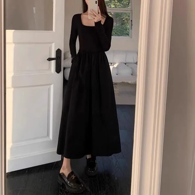 Women's black square collar knitted dress with long sleeves, elastic waist, and A-line long skirt.