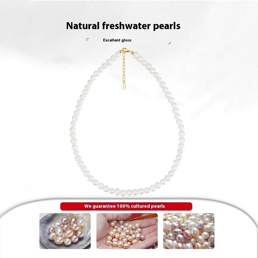 Adjustable silver necklace with a string of freshwater pearls on a model