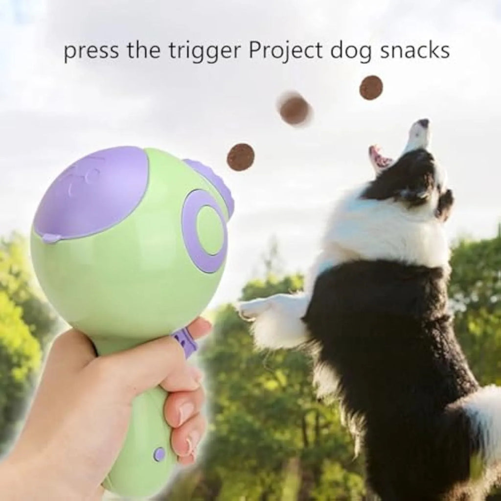 Green, orange, and pink interactive dog treat launcher toy with food dispenser.