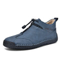 Men's black casual leather shoes with a round toe, tall crown, and a rubber sole.