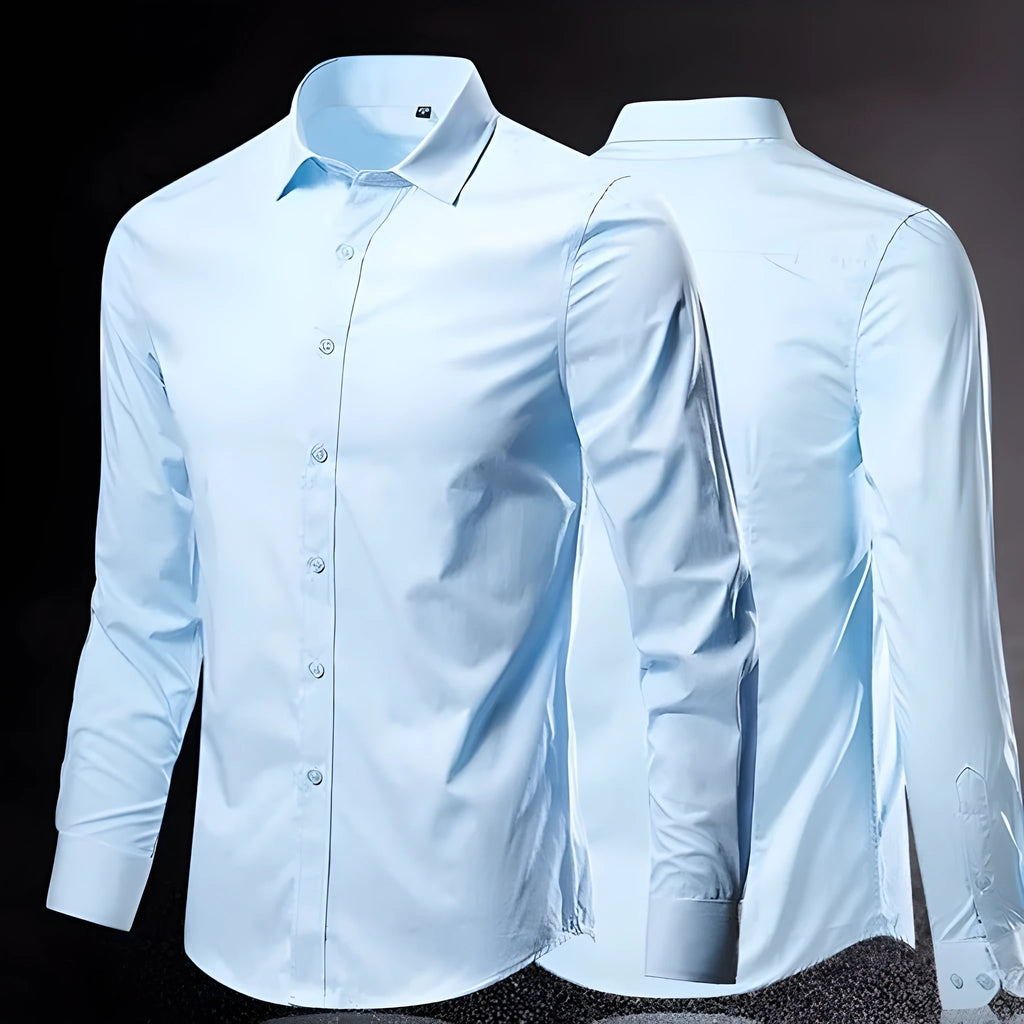 Man wearing a loose-fit long-sleeve linen shirt in a neutral colour, showcasing the casual fit and texture.