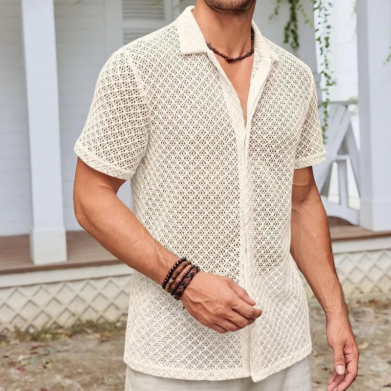 Men's solid colour short sleeve lapel shirt in cotton blend fabric on a hanger.