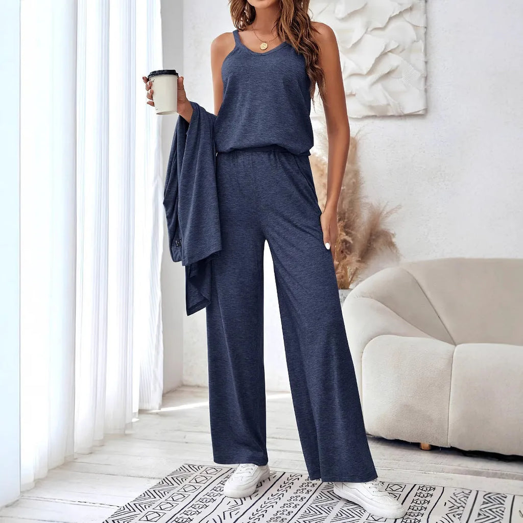 Blue women's three-piece casual suit set with sling top, cardigan, trousers, and suspenders on a hanger.