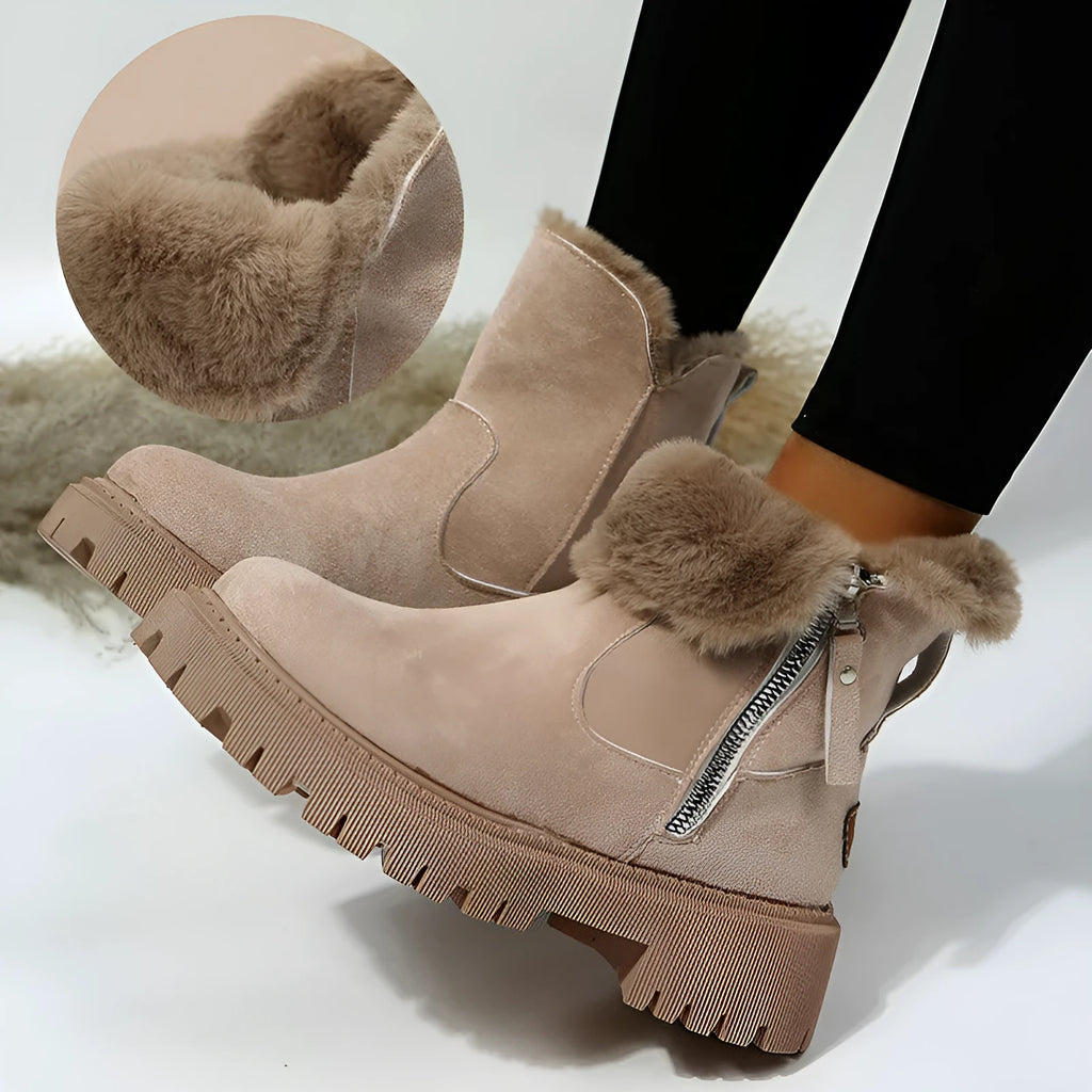Women's black thick plush snow boot with side zipper and round toe on a rubber sole.