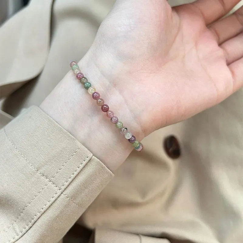 Women's geometric pink crystal bracelet with electroplated finish showing eight style variations