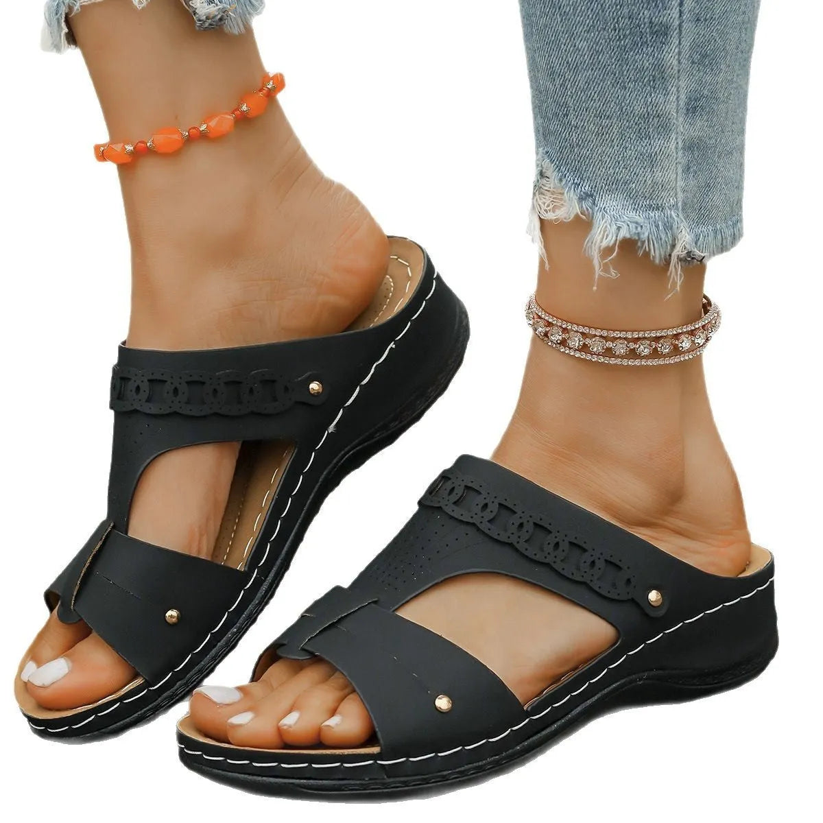 Roman style slope heel slipper in blue with a fish mouth toe holder and rubber sole