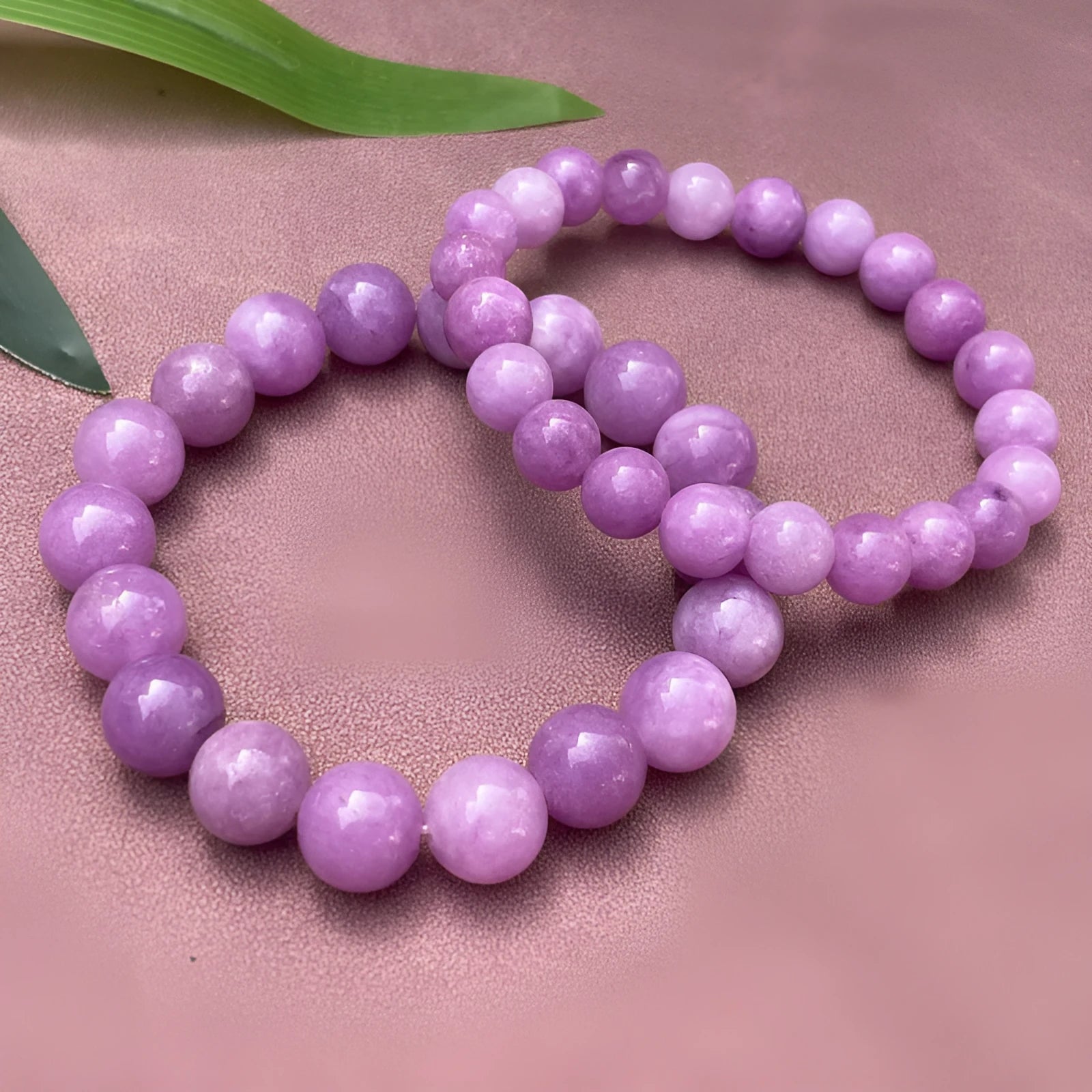 Chinese style quartz jade bracelet showing single circle and plain three ring bead designs