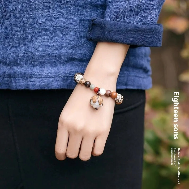 Women's 18-seed Bodhi beads bracelet with geometric design and 16cm circumference