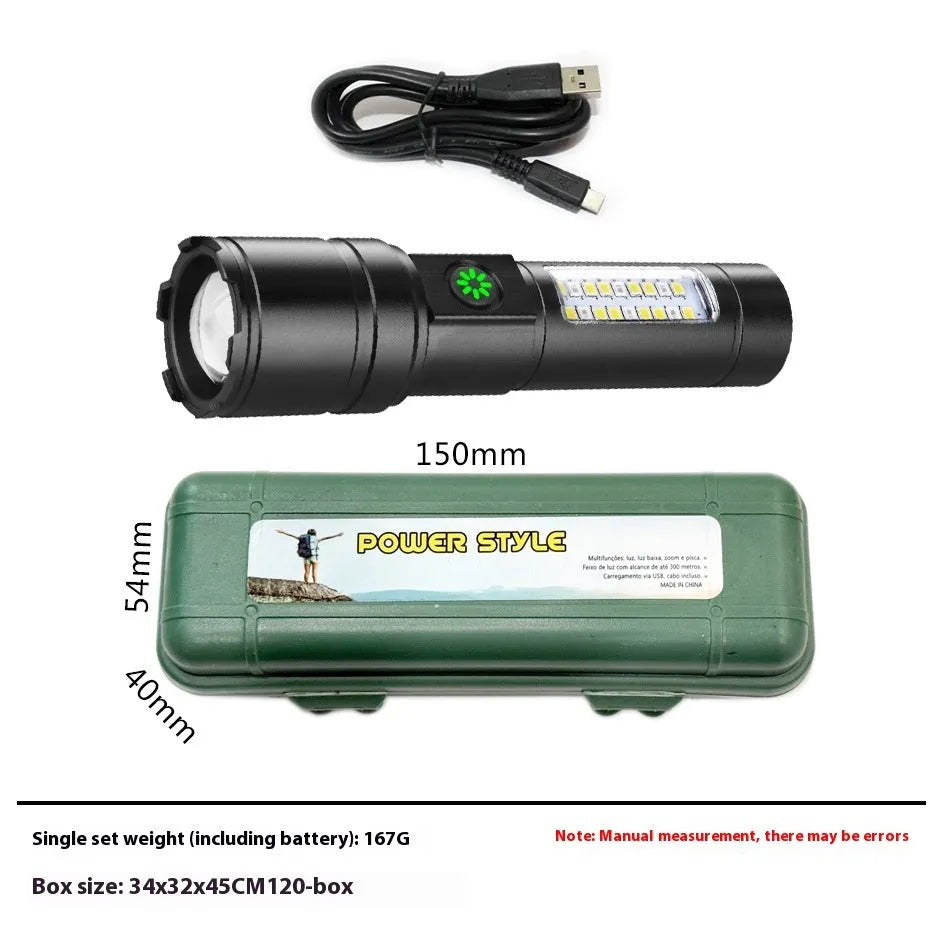 Black aluminum alloy USB rechargeable flashlight with optical zoom on table