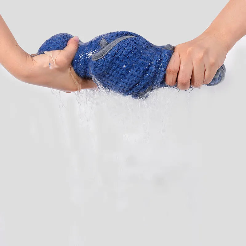 Blue adjustable dog bath robe towel wrapped around medium-sized dog