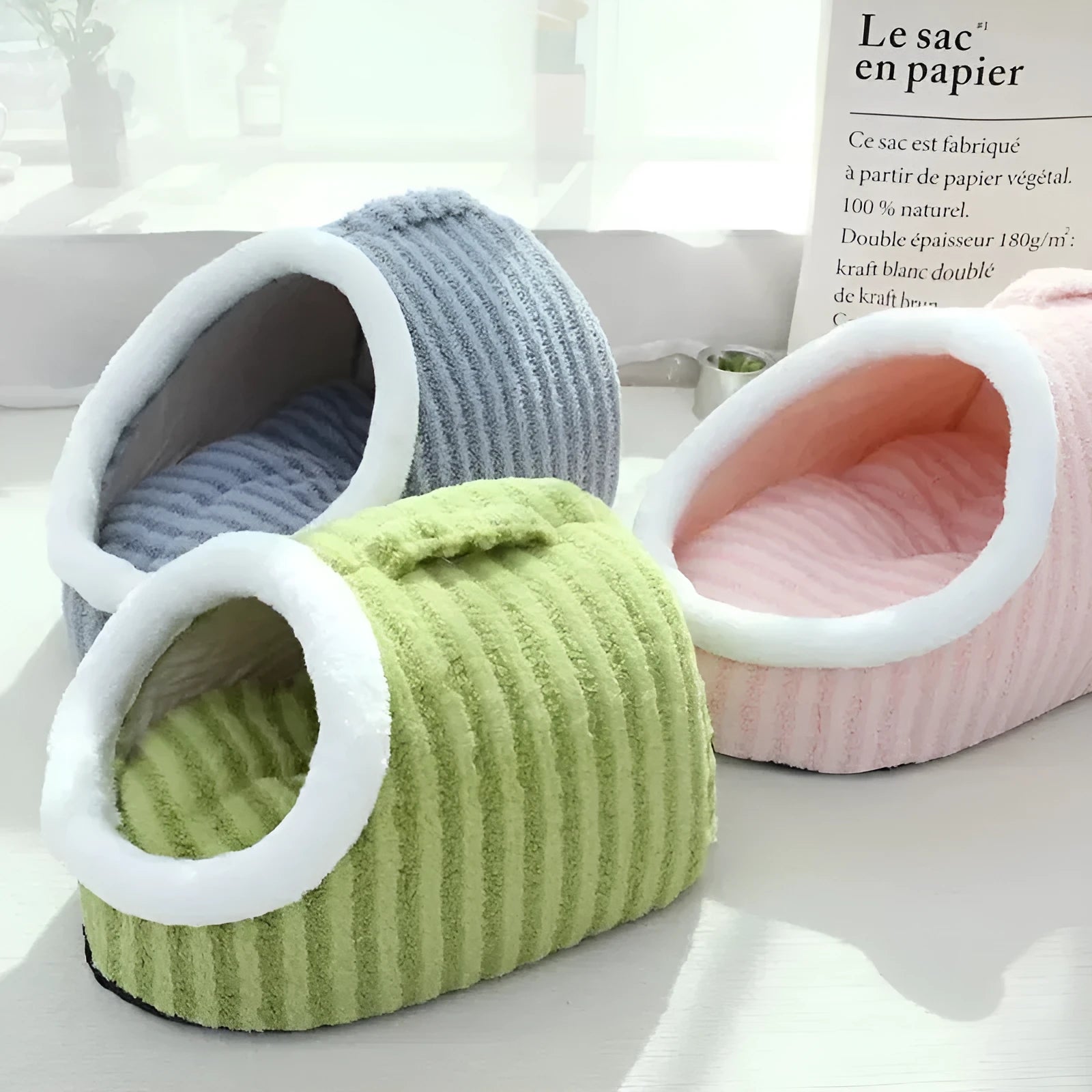 Blue striped thickened 3D dog bed with raised sides and a hole for burrowing, showing removable sponge insert.