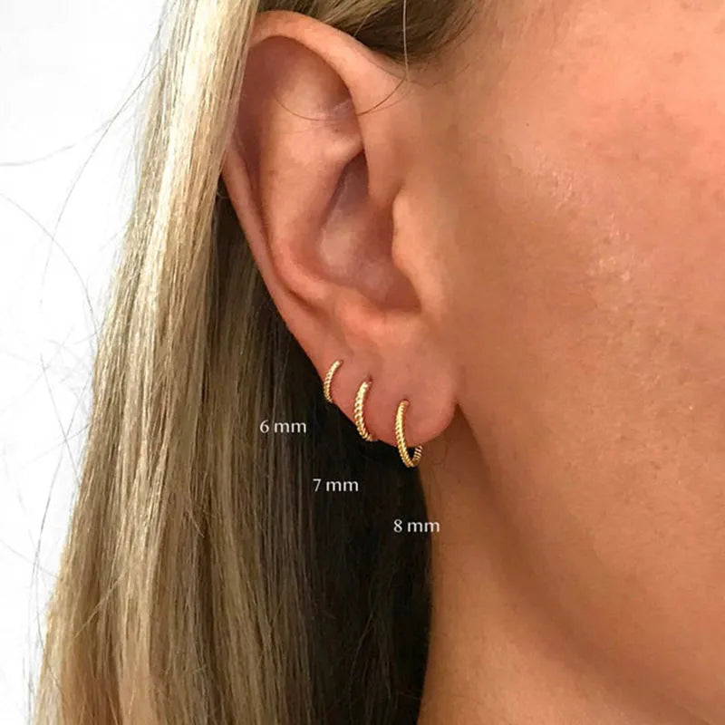 Twisted string round ring earrings in sterling silver with gold plating