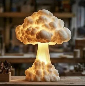 Modern art table lamp shaped like a mushroom cloud explosion, with USB cable for power.
