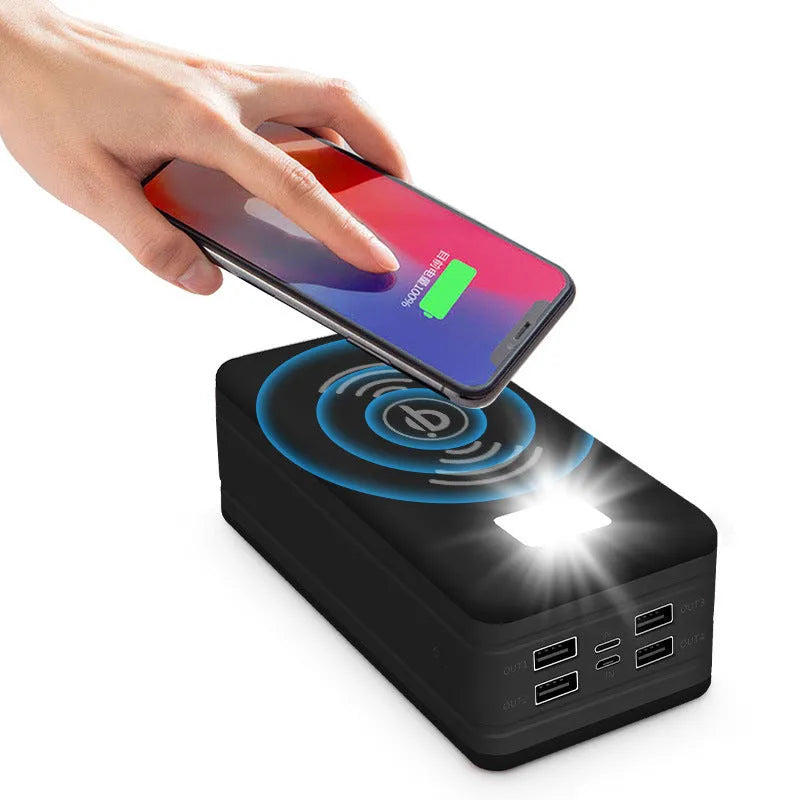 Large capacity solar wireless power bank in black with coloured accents showing solar panel and wireless charging surface