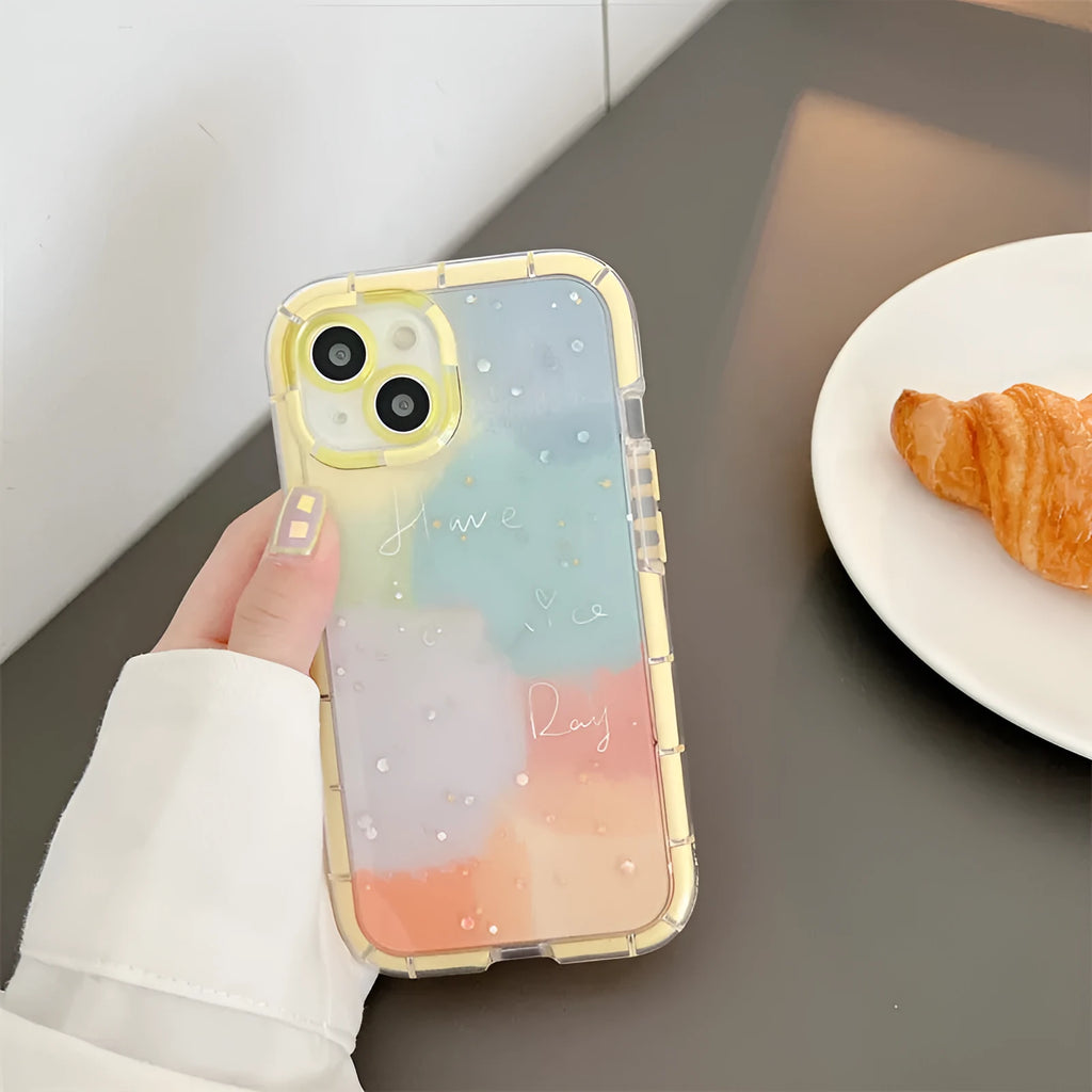 Yellow-edged minimalist contrast colour TPU silicone case on an Apple iPhone.