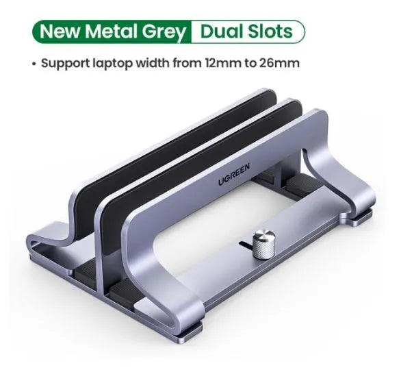 Silver aluminium alloy adjustable computer bracket clamped to a desk edge.