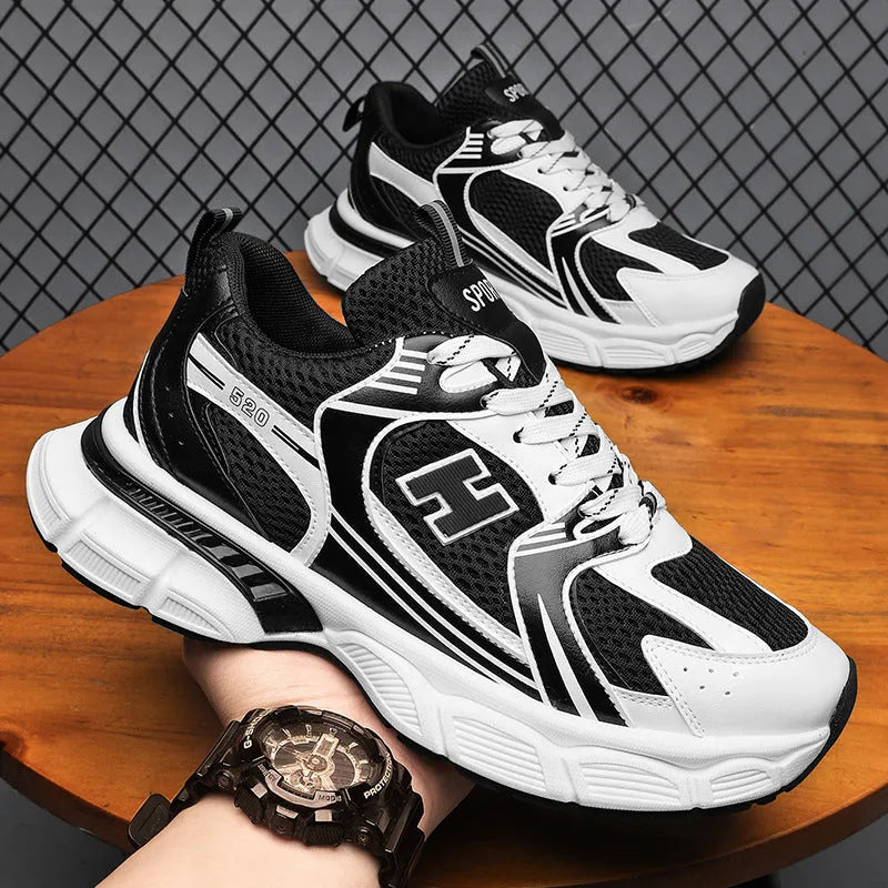 Men's mesh running shoes in black, white and grey, and white orange colours with plastic soles