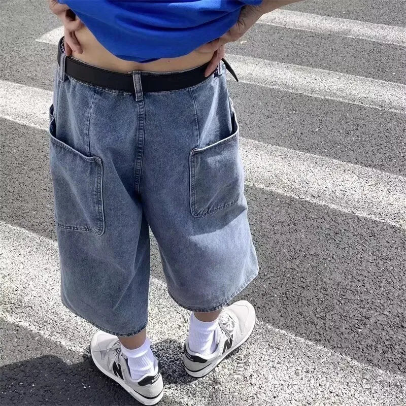 Blue men's thin denim pirate shorts with high waist and cropped straight legs on a neutral background.