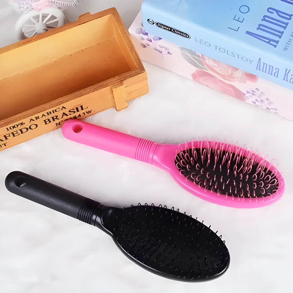 Black and pink ring tooth airbag comb for hair extensions, 22cm long.
