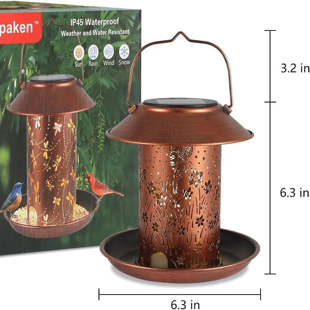 Iron art solar-powered bird feeder lamp with hummingbird pattern design for outdoor garden use.