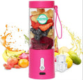 Black portable hand blender with transparent 530ml measuring cup and five-blade cutter head.