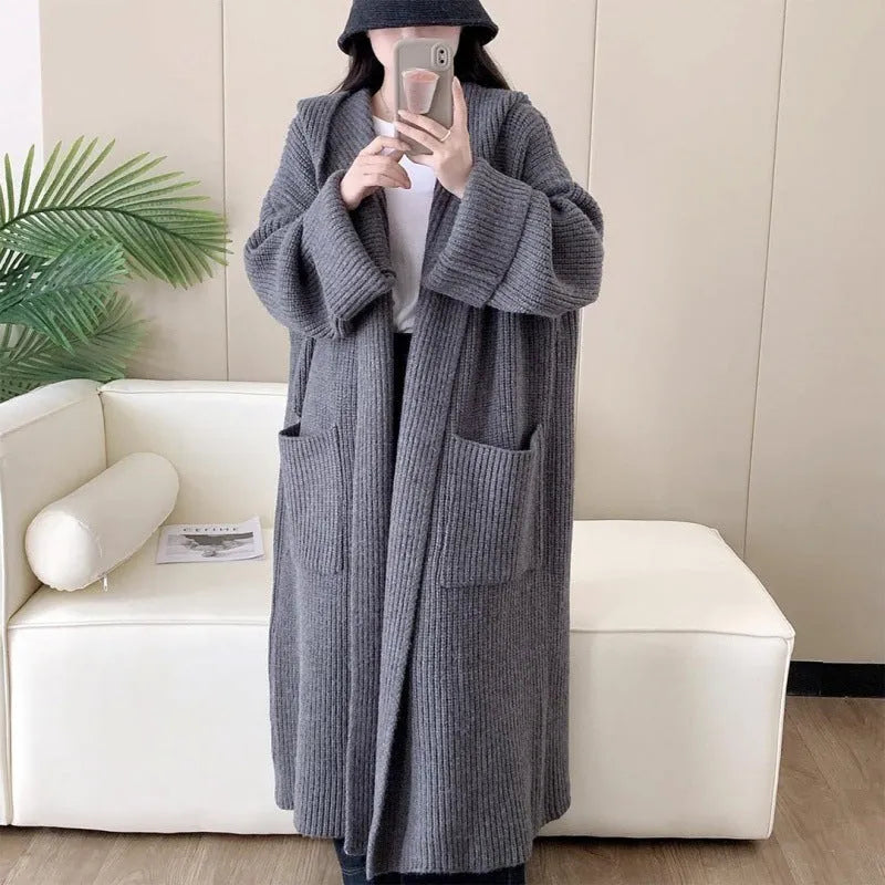 Loose grey hooded cardigan coat for women with raglan sleeves, shown open as an oversized layer.