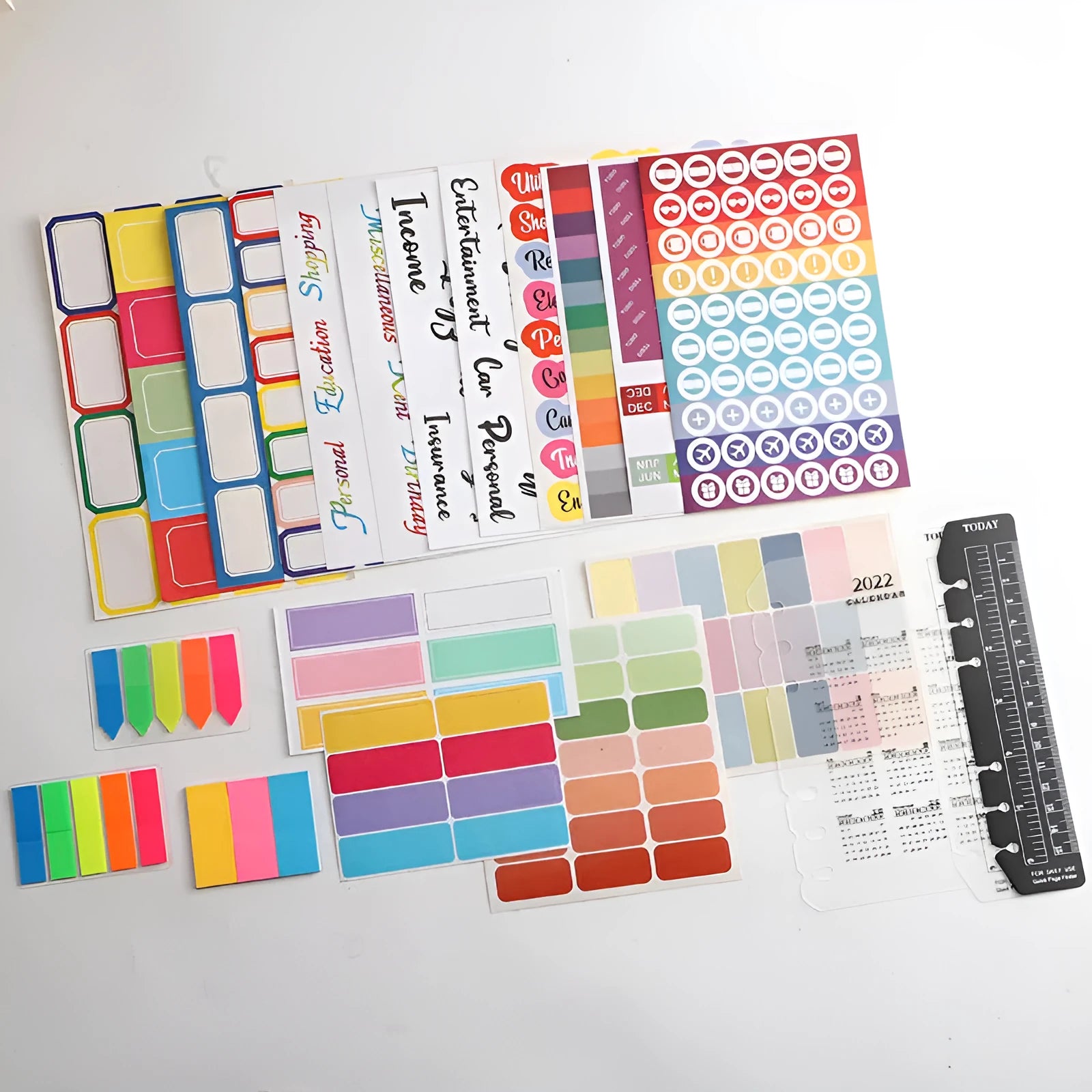 Handwritten labels and adhesive stickers showing grid configurations and colour options including white German adhesive stickers