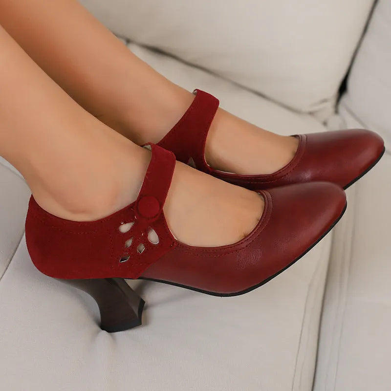 Women's round toe buckle shoes with chunky heel and rubber sole, black colour, low top design