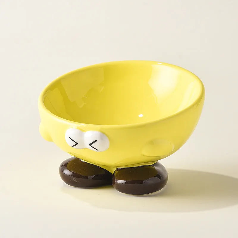 Blue oblique tall ceramic pet bowl with a cute expression design for cats and dogs.