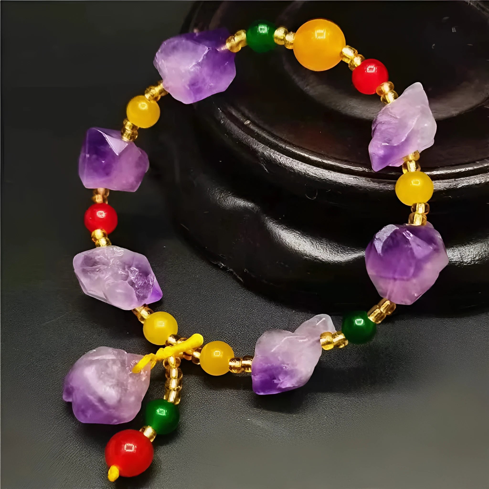 Natural shaped purple amethyst bead bracelet with a fu character charm for women.