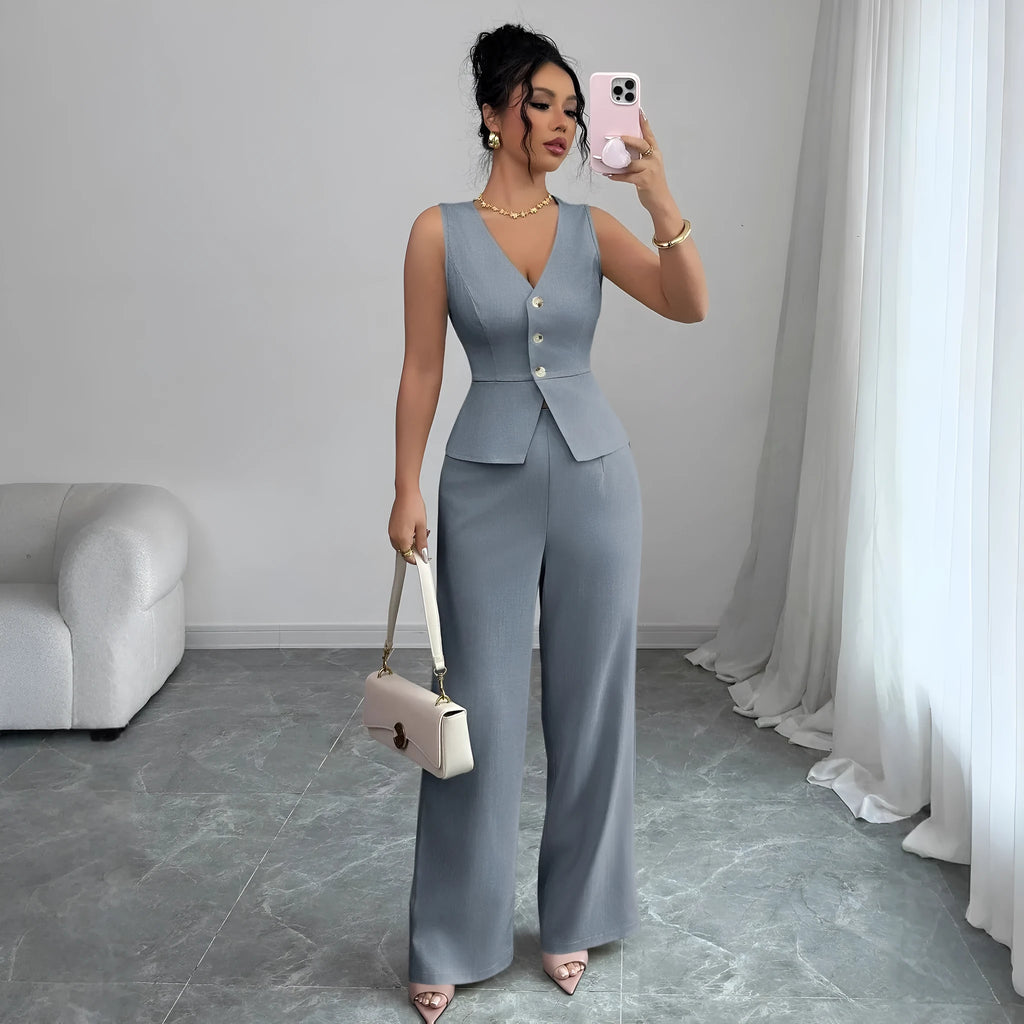 Women's black sleeveless vest and high-waist trousers two-piece casual set.