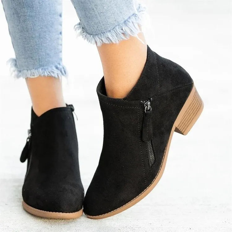 Women’s suede leather ankle boots with side zipper, thick heel, pointed toe, and non-slip sole in beige colour