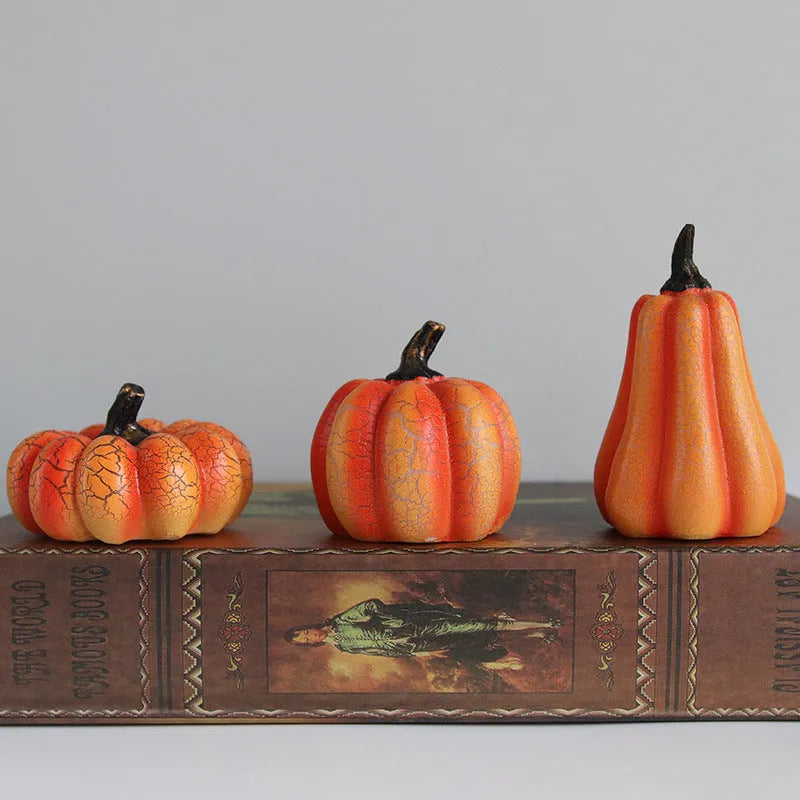 Three Halloween pumpkin lanterns in short, medium, and long sizes with LED illumination and realistic surface cracks