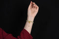 Two Shihuan natural Hetian jade bracelet with 6mm beads, fu charm, and lotus motif on a wrist.