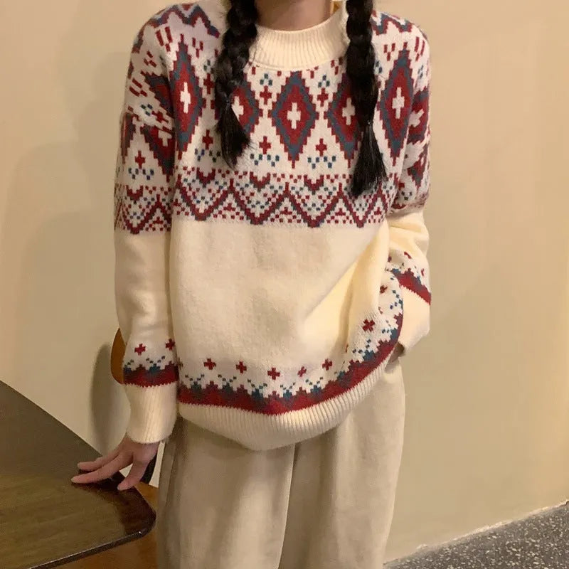 A woman wearing a loose red and white striped long-sleeved knitted pullover top.