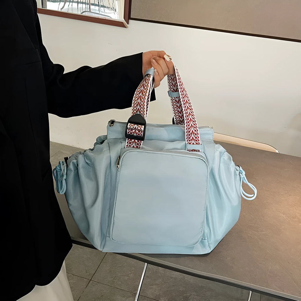 Nylon mommy bag in large capacity tote style, available in multiple colours for travel and daily use