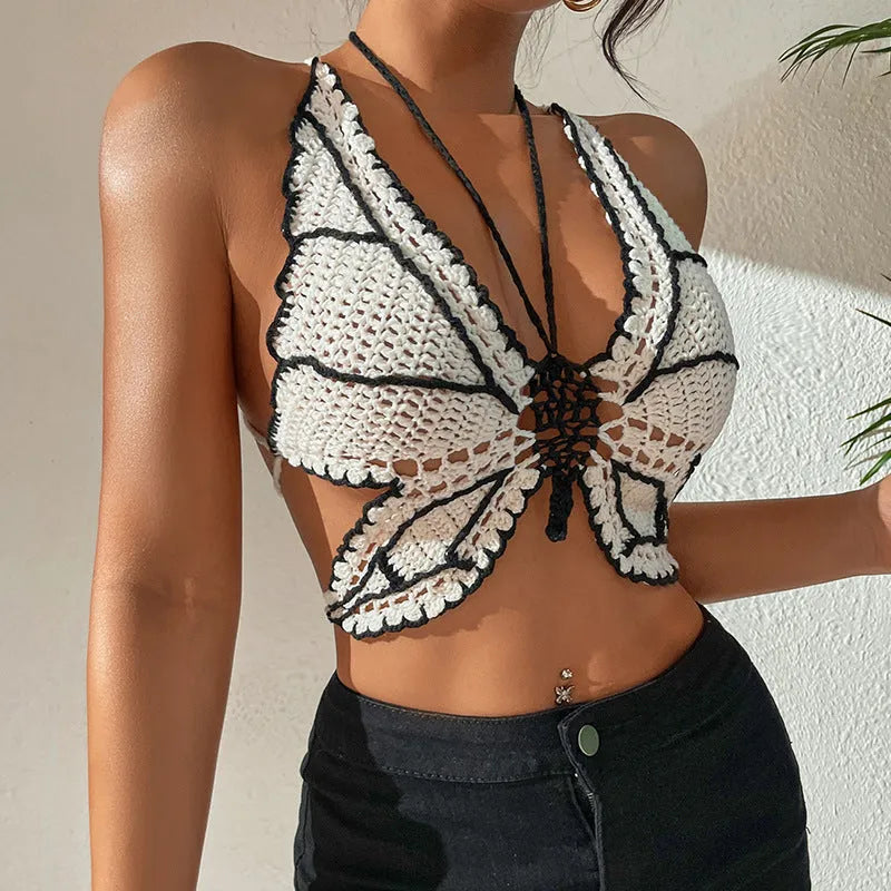 Women's black and white classic bikini swimsuit made from acrylic fabric.