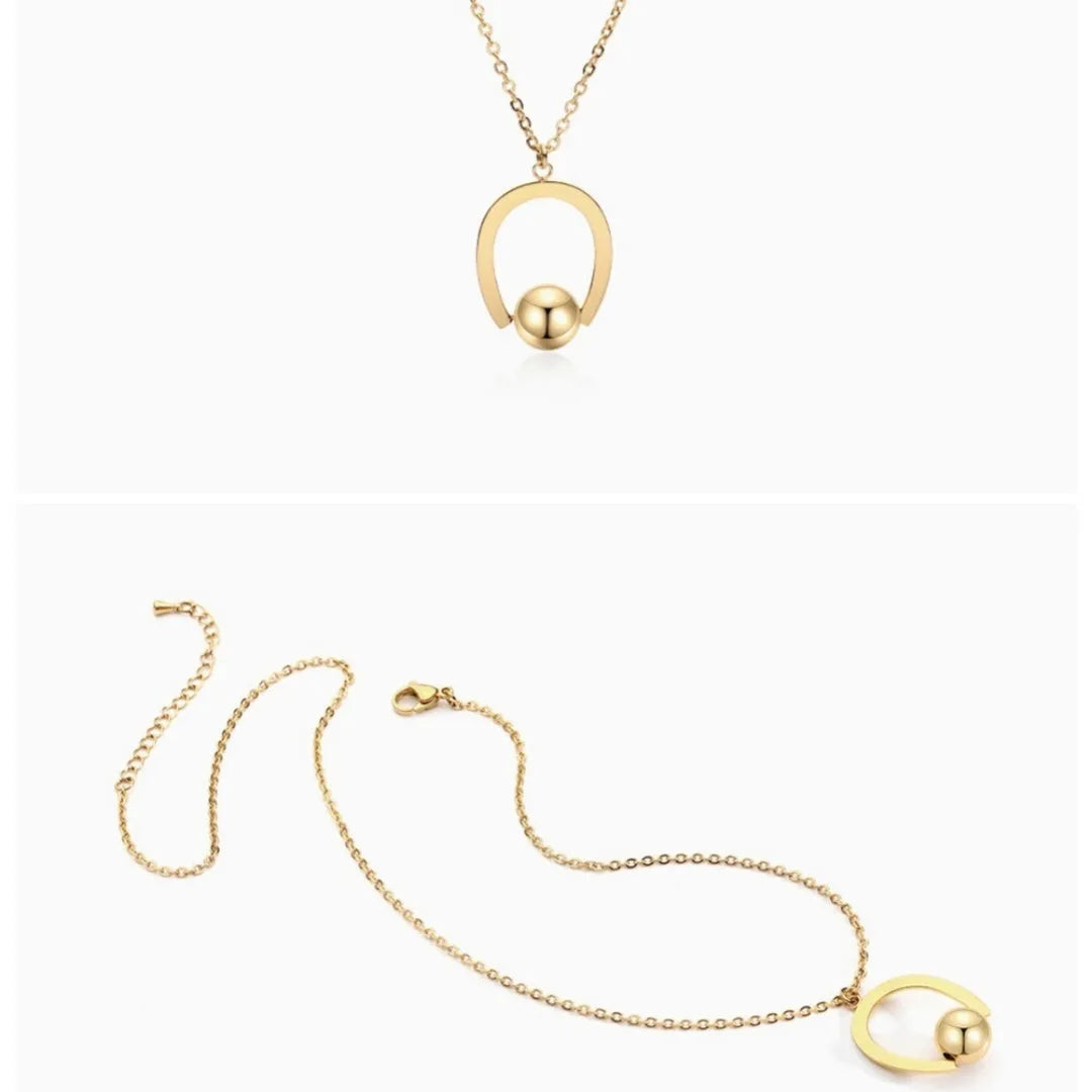 Gold-coloured adjustable stainless steel necklace with a geometry pendant on a cross chain.