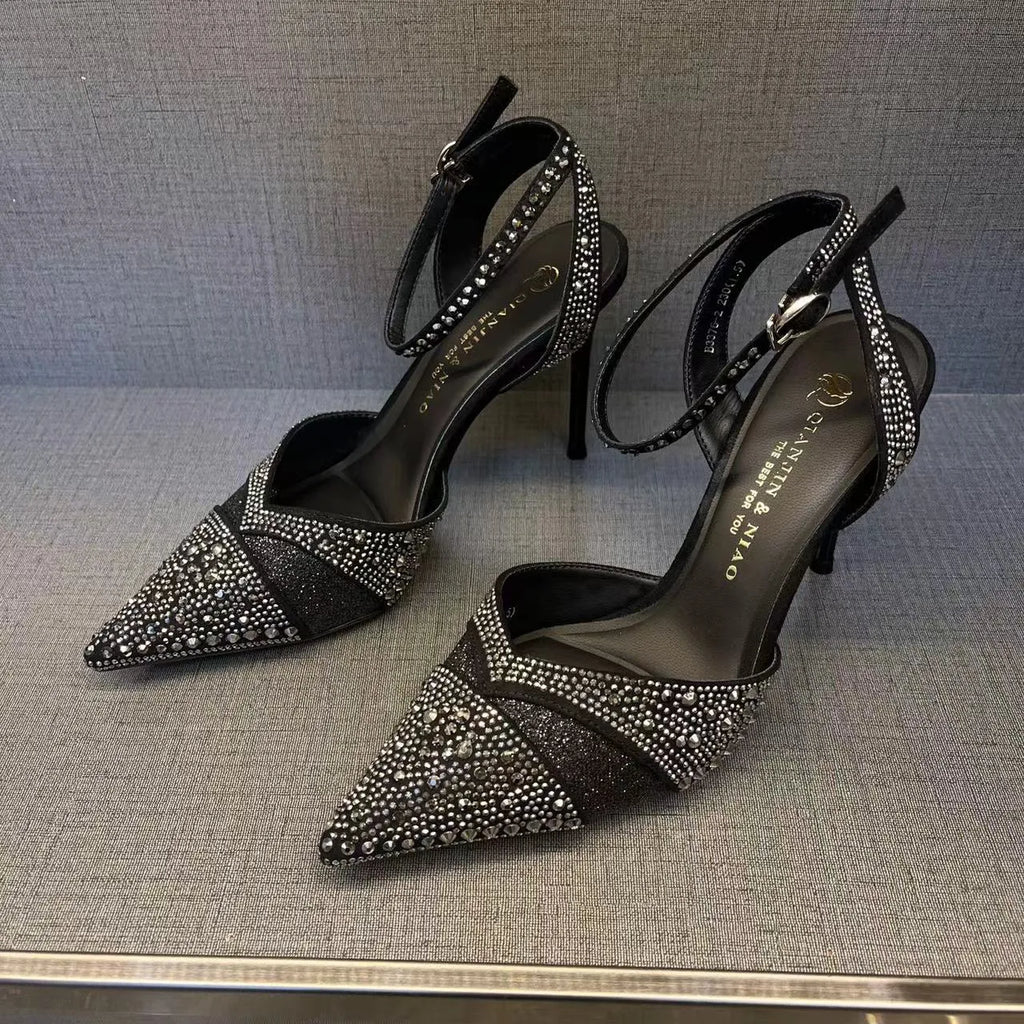 Women's black pointed-toe stiletto high heels with a hollow heel and red sole