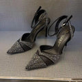 Women's black pointed-toe stiletto high heels with a hollow heel and red sole