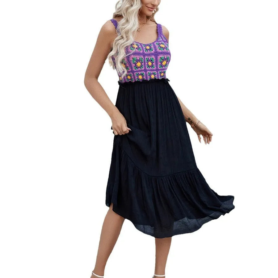 Purple sleeveless dress with hand-embroidered flower pattern on cotton blend fabric.