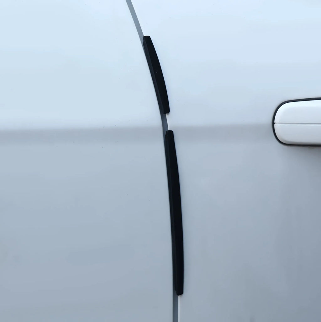 White plastic car door side bumper strip anti-collision protection set.