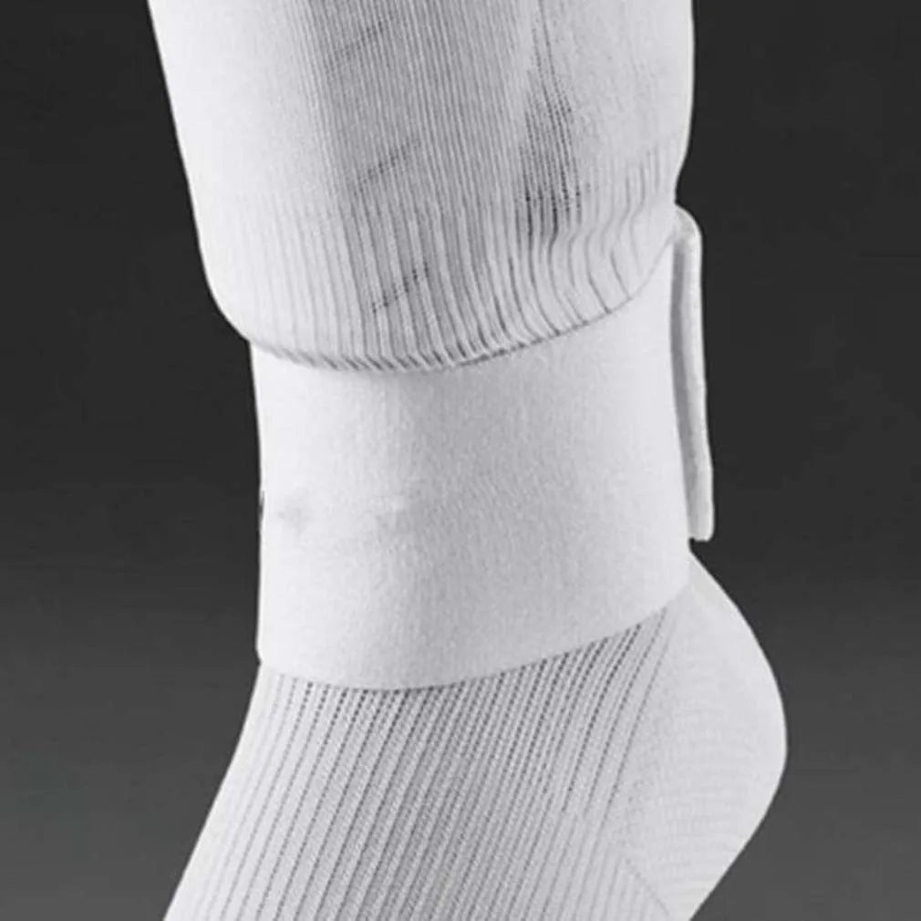 Rubber football shin guard tape belt measuring 25x6.5cm in four colour options