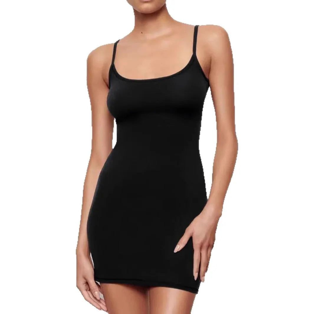Black sleeveless sling dress with a mid waist and short skirt sheath silhouette.