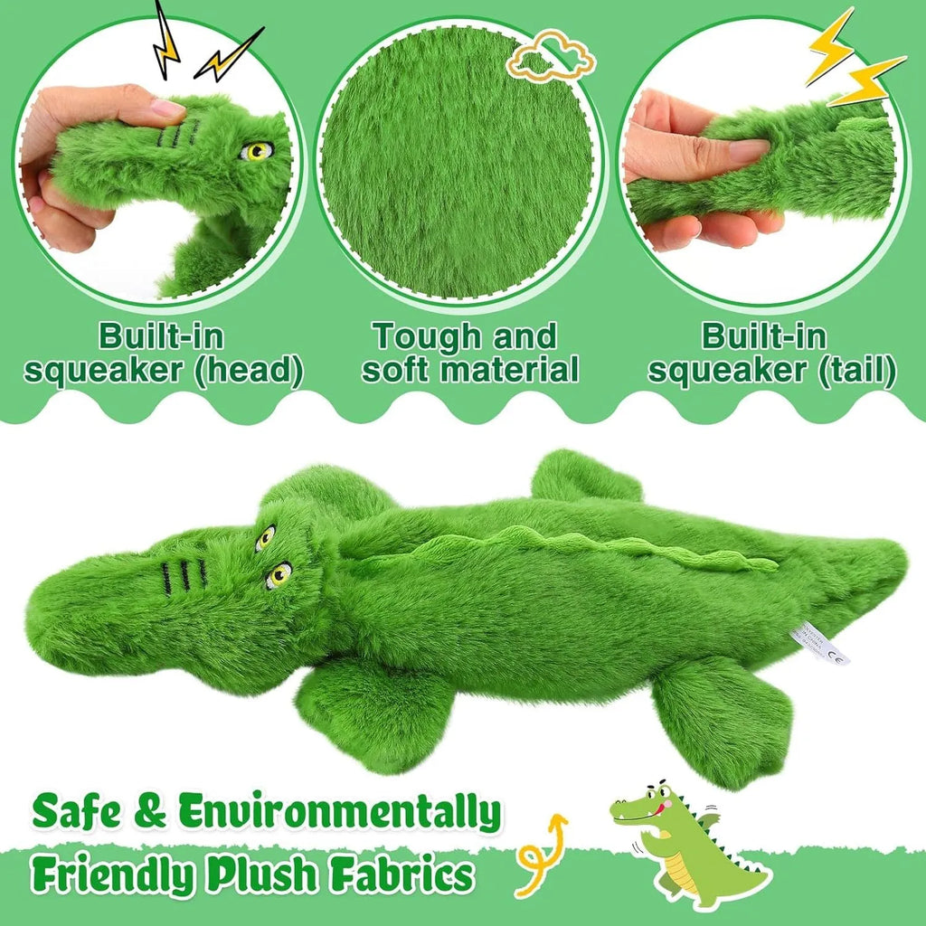 Green plush crocodile dog toy with no stuffing, featuring a squeaker and crinkle paper tail.