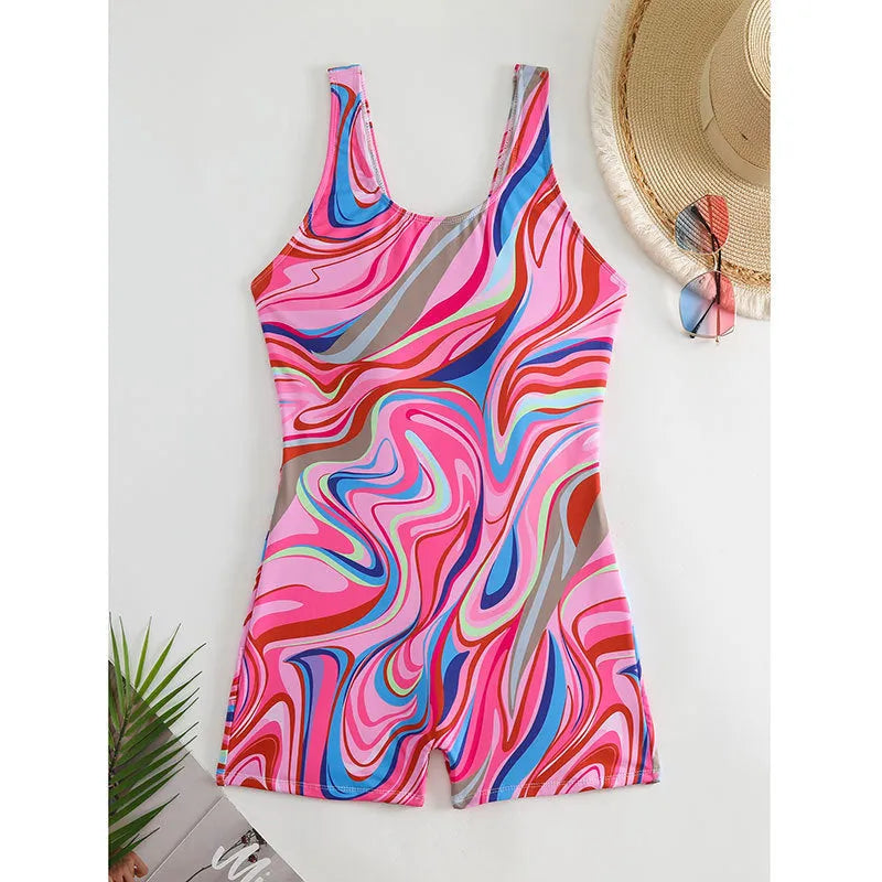 Printed high-waist backless one-piece swimsuit on a hanger, showing the polyester fabric and design.